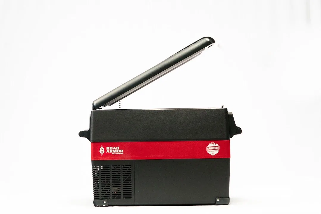 RACF45 – ROAD ARMOR Refrigerator, 6 Can Capacity 12 Volt Electric Black and Red Plastic With AC to DC Adaptor With Po...